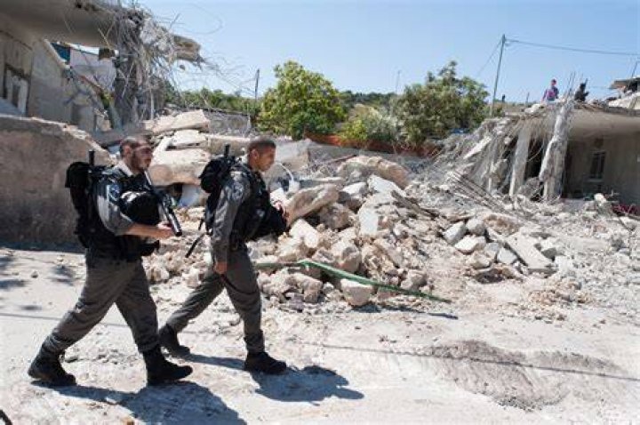 Autistic Palestinian shot by Israeli police buried amid revenge call