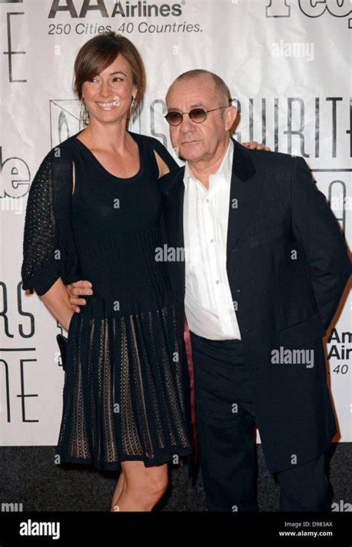 Bernie Taupin and Heather Lynn Hodgins Kidd walking on the red carpet