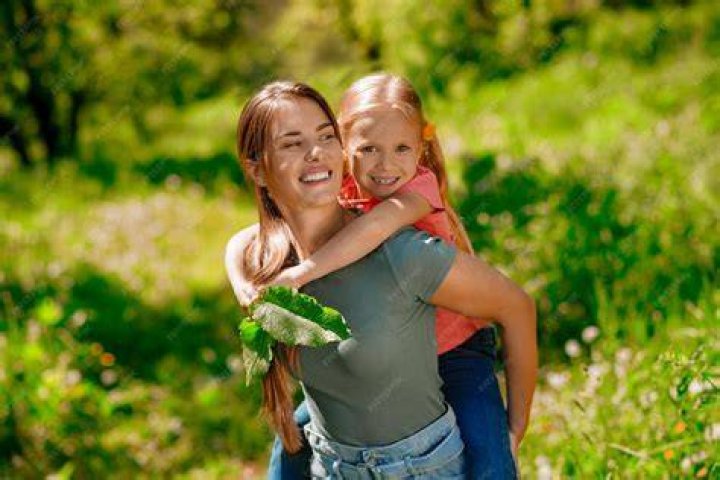 Mom Carrying Her Kid on Her Back and Both Feeling Amazing Stock Image Image of pink, child
